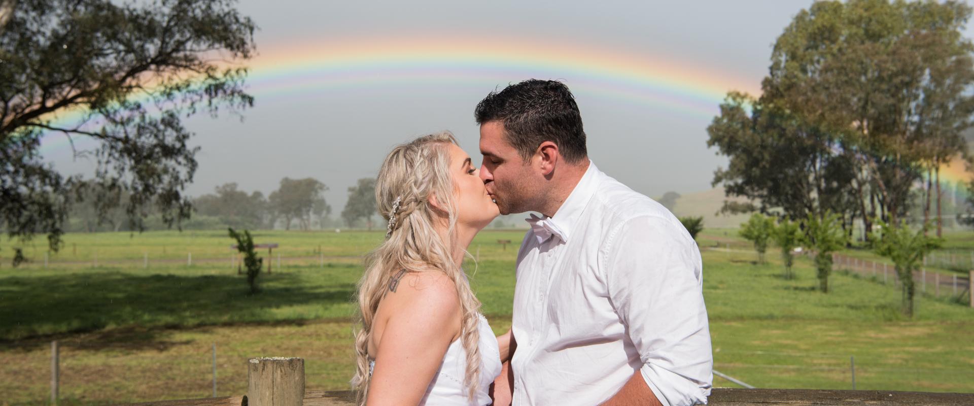 Romantic Wedding Photo with Rainbow
